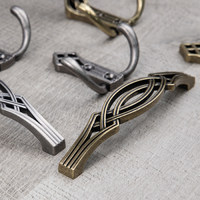 Крючок мебельный двухрожковый PALAZZO античная латунь AKS 81197